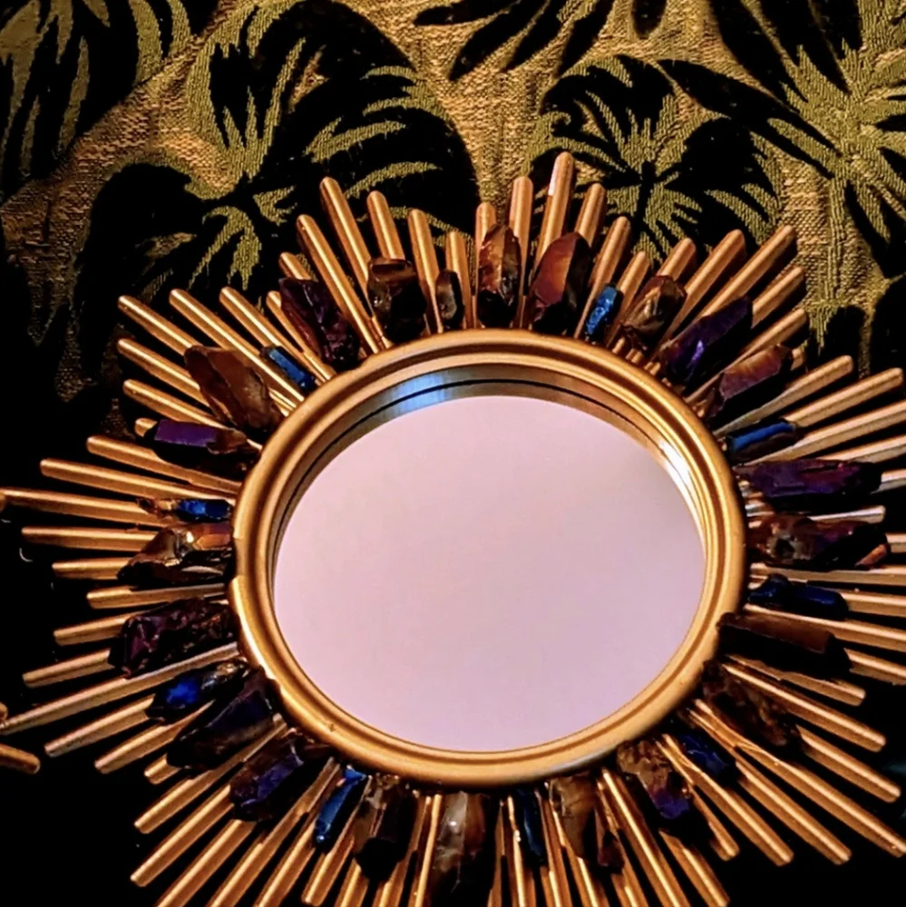 Set of three gold tone wall hanging accent mirrors with titanium coated quartz